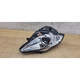 Optique de phare gauche Peugeot Geopolis