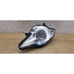 Optique de phare gauche Peugeot Geopolis