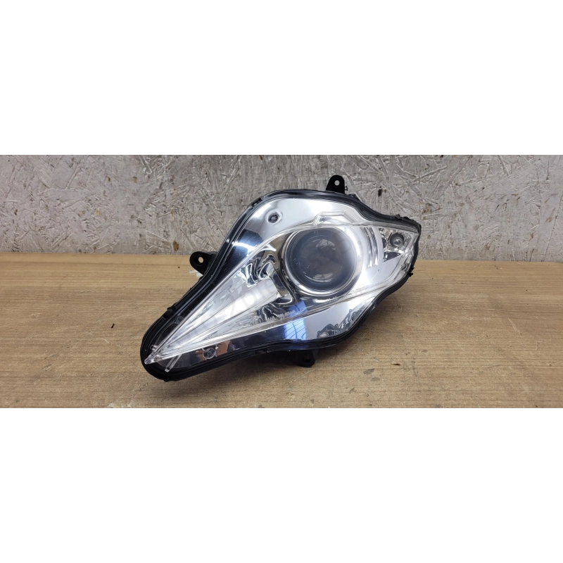 Optique de phare gauche Peugeot Geopolis